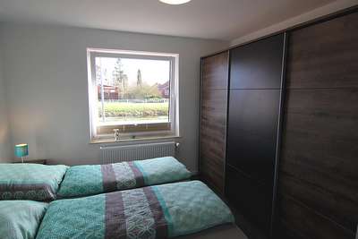 Schlafzimmer der Ferienwohnung Wiekenhuus.