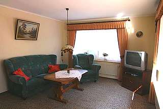 Ferienwohnung Janssen in Ostrhauderfehn-Potshausen. Ferienwohnung im Ferienhaus auf dem Bauernhof in Ostfriesland - mit Hund.