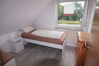 Das dritte Schlafzimmer im Obergeschoss der Ferienwohnung An den Wieken 2